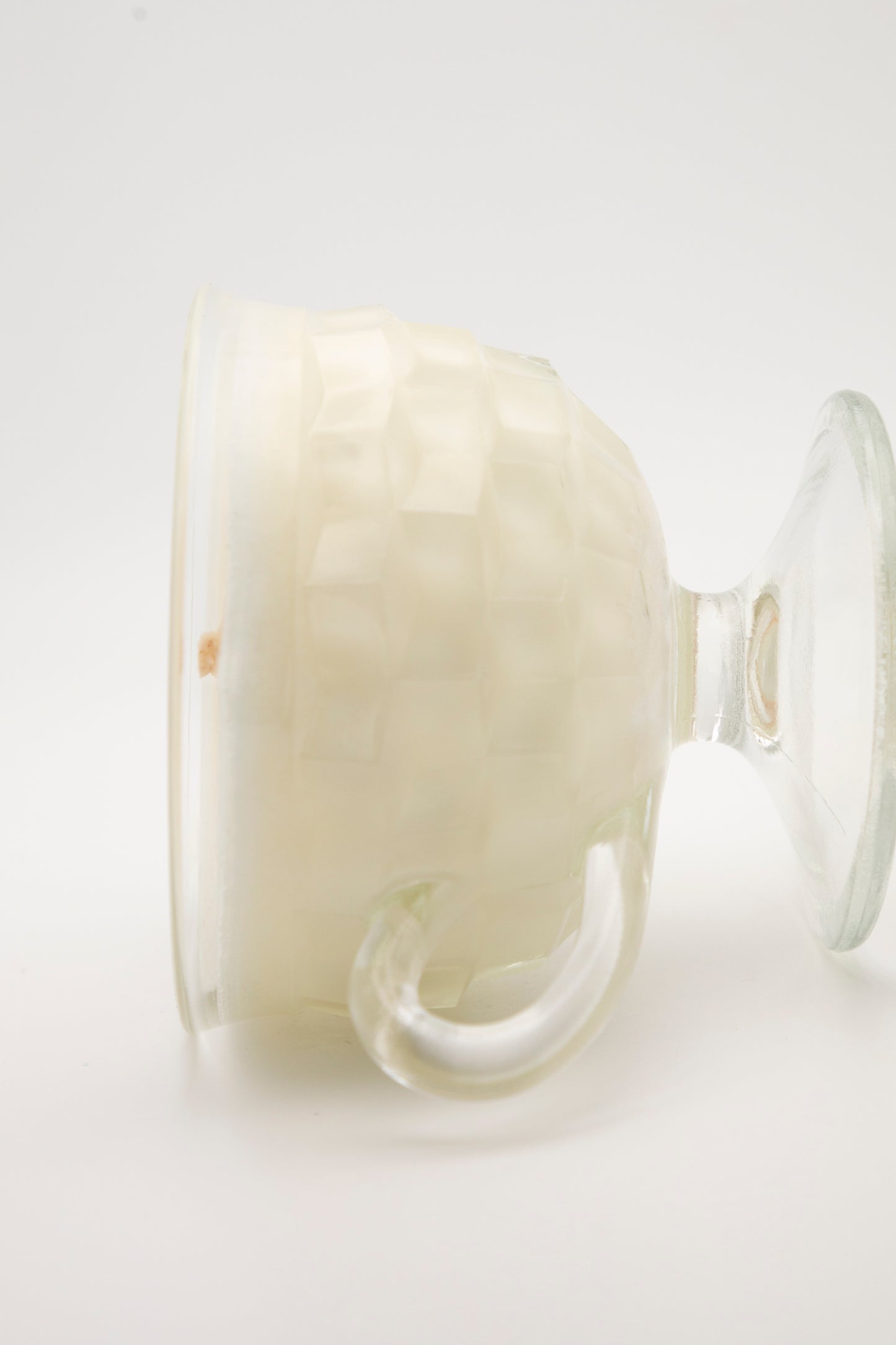 elevated glass teacup with handle