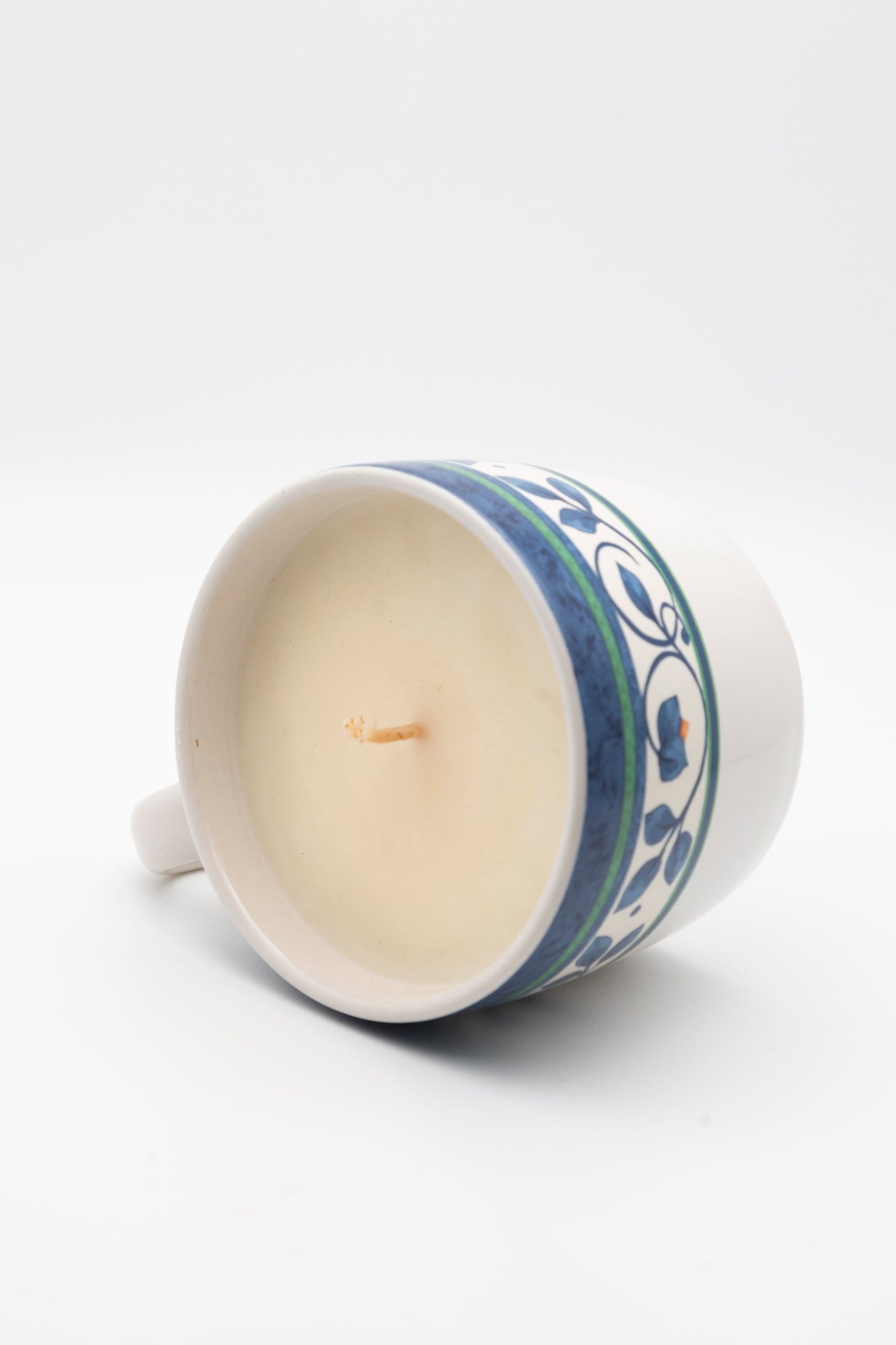 blue floral designed teacup