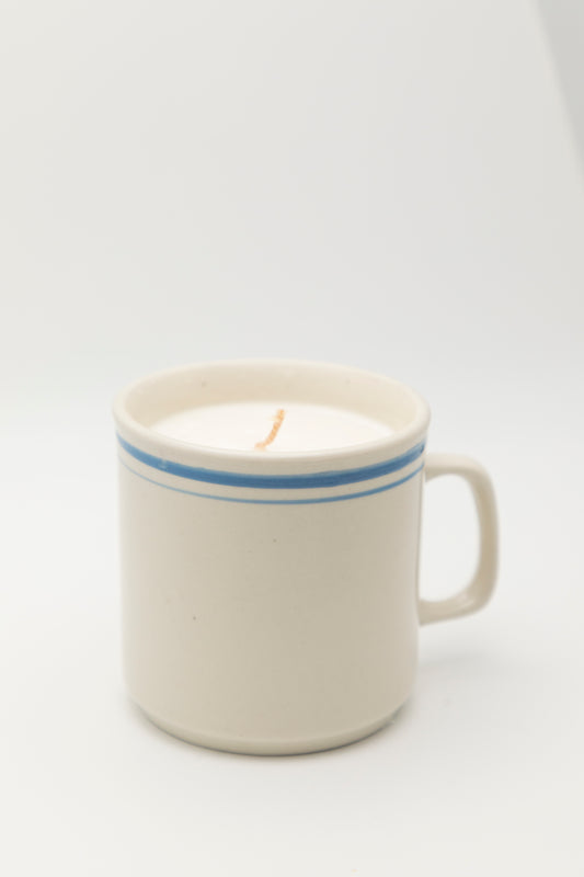 farmhouse style mug with blue rim