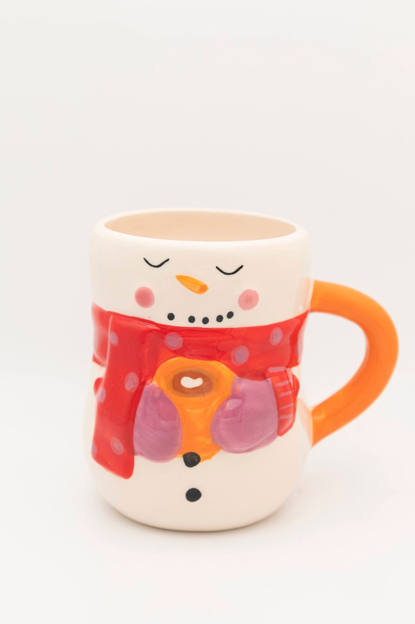 snowman style mug with red scarf