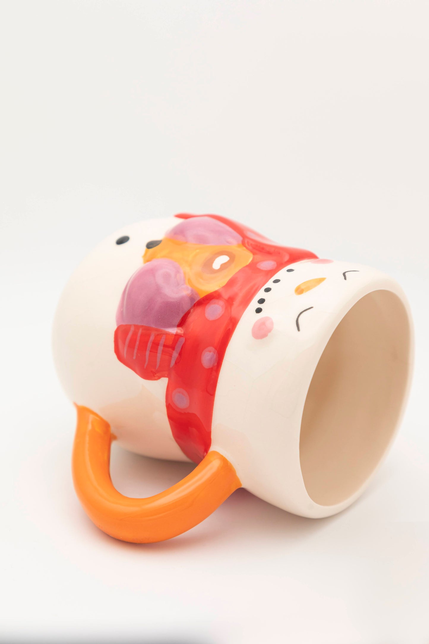 snowman style mug with red scarf