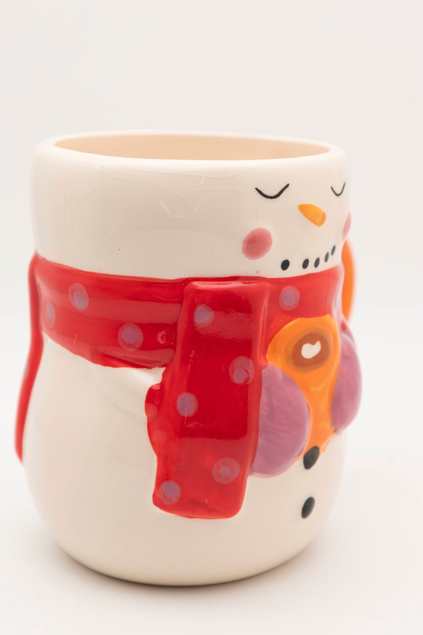 snowman style mug with red scarf