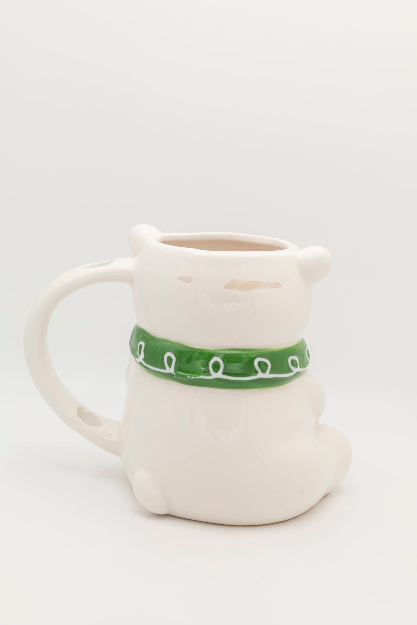 white bear with green scarf mug