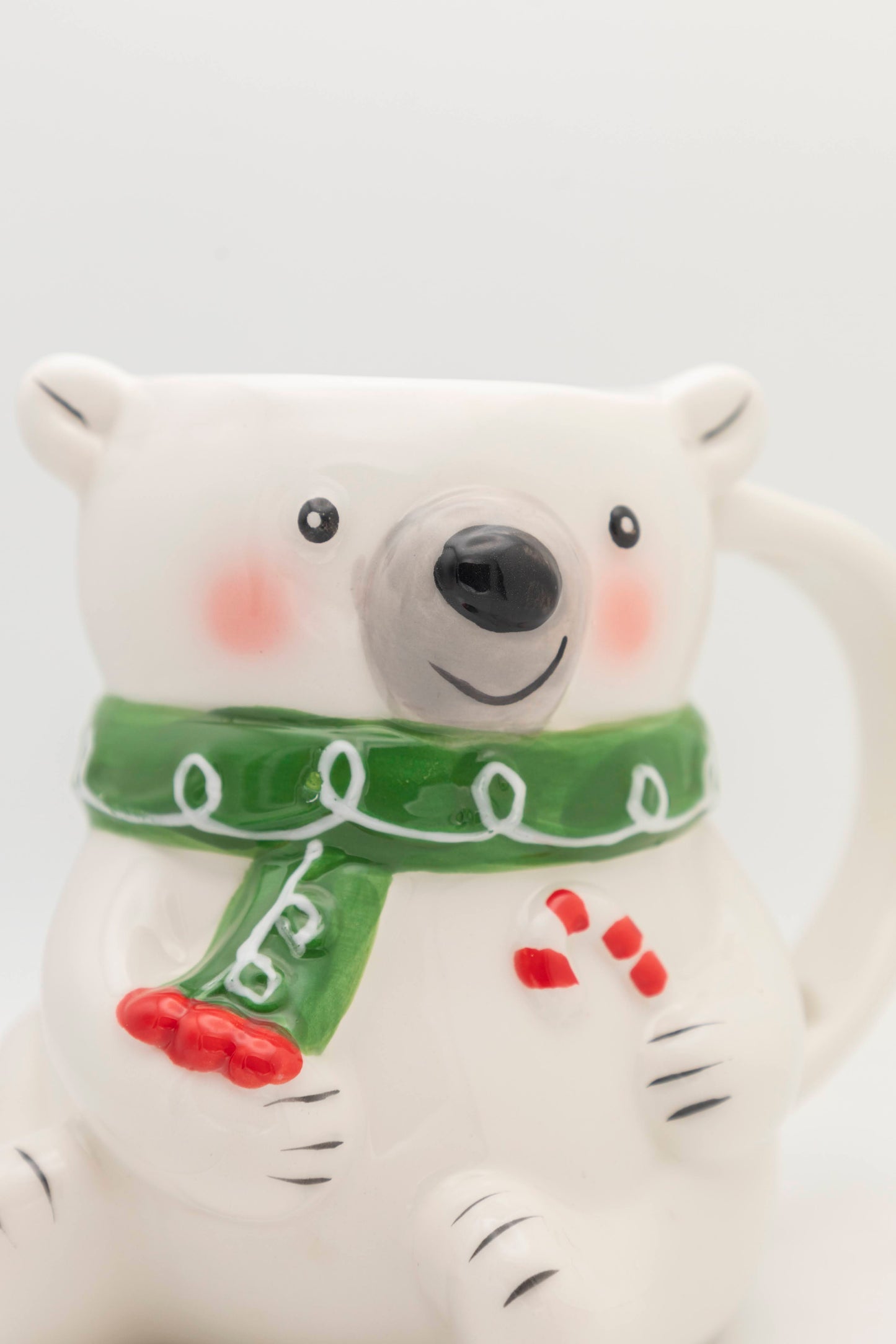 white bear with green scarf mug