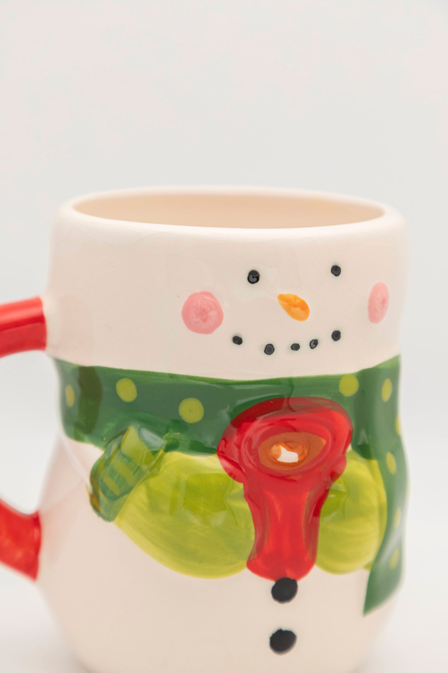 snowman style with green scarf mug