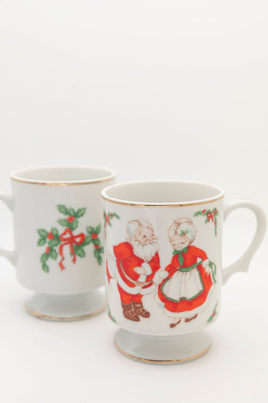 mr and mrs clause and mistletoe mug