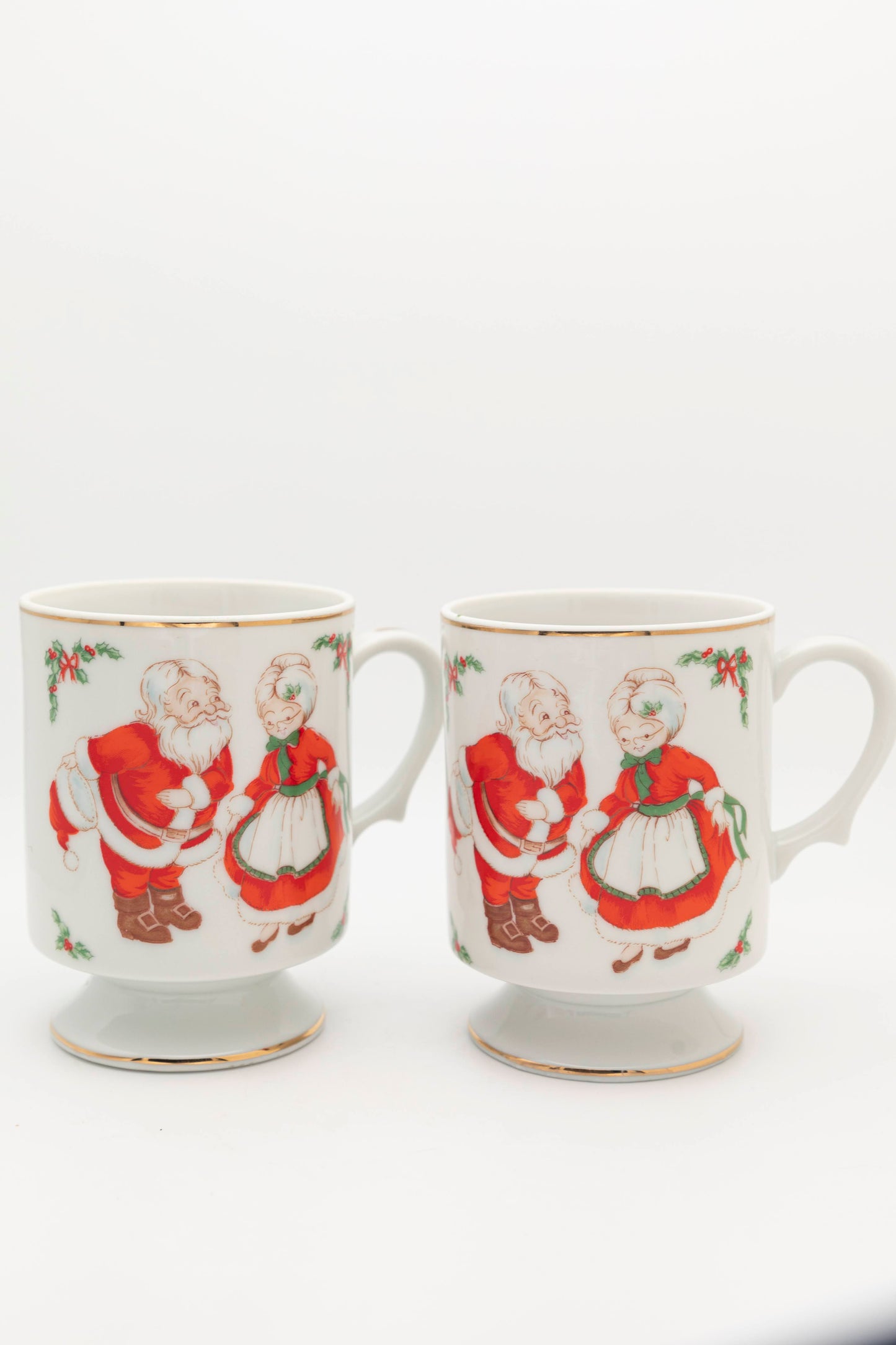 mr and mrs clause and mistletoe mug