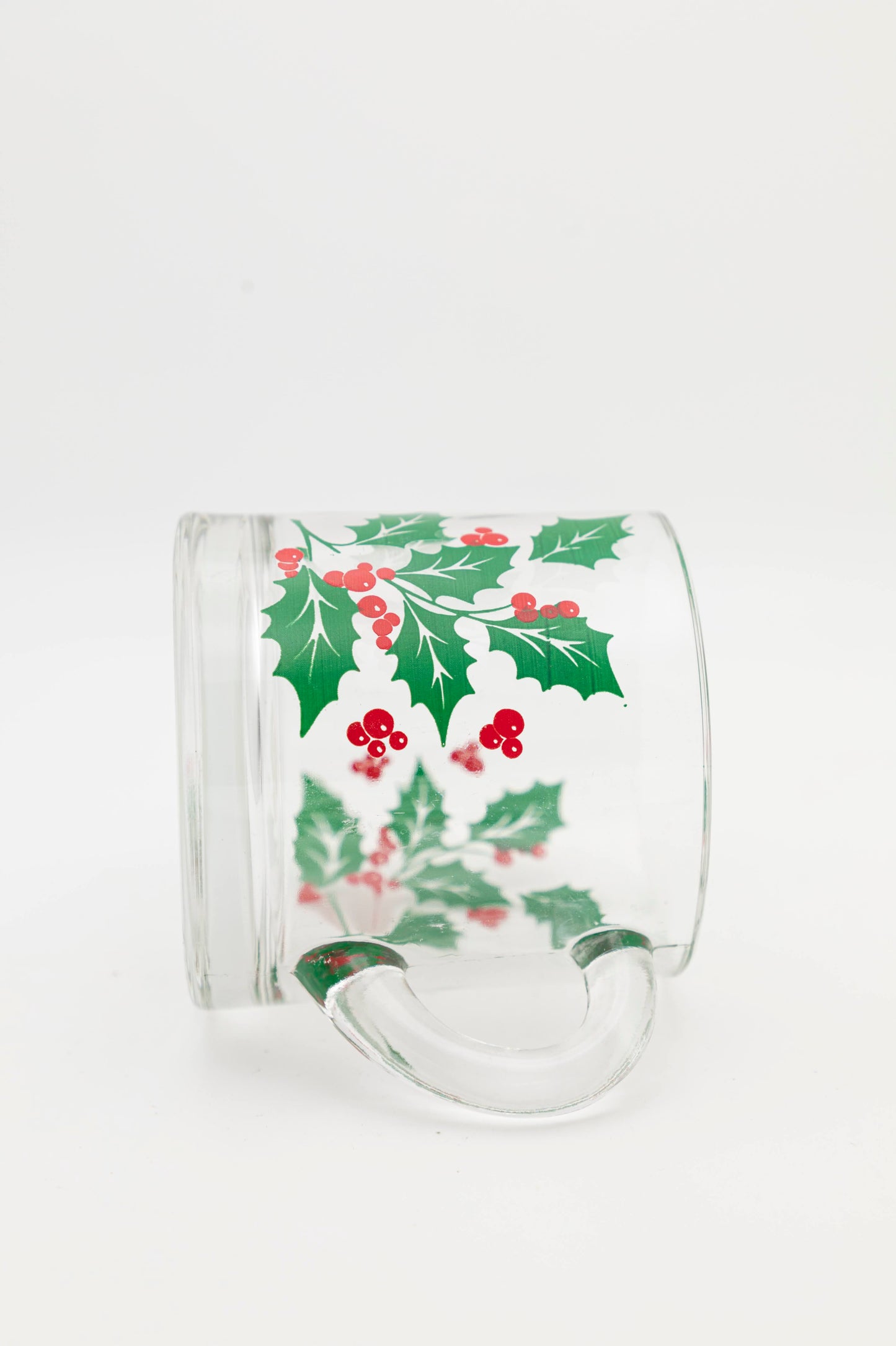 small glass mug with mistletoe