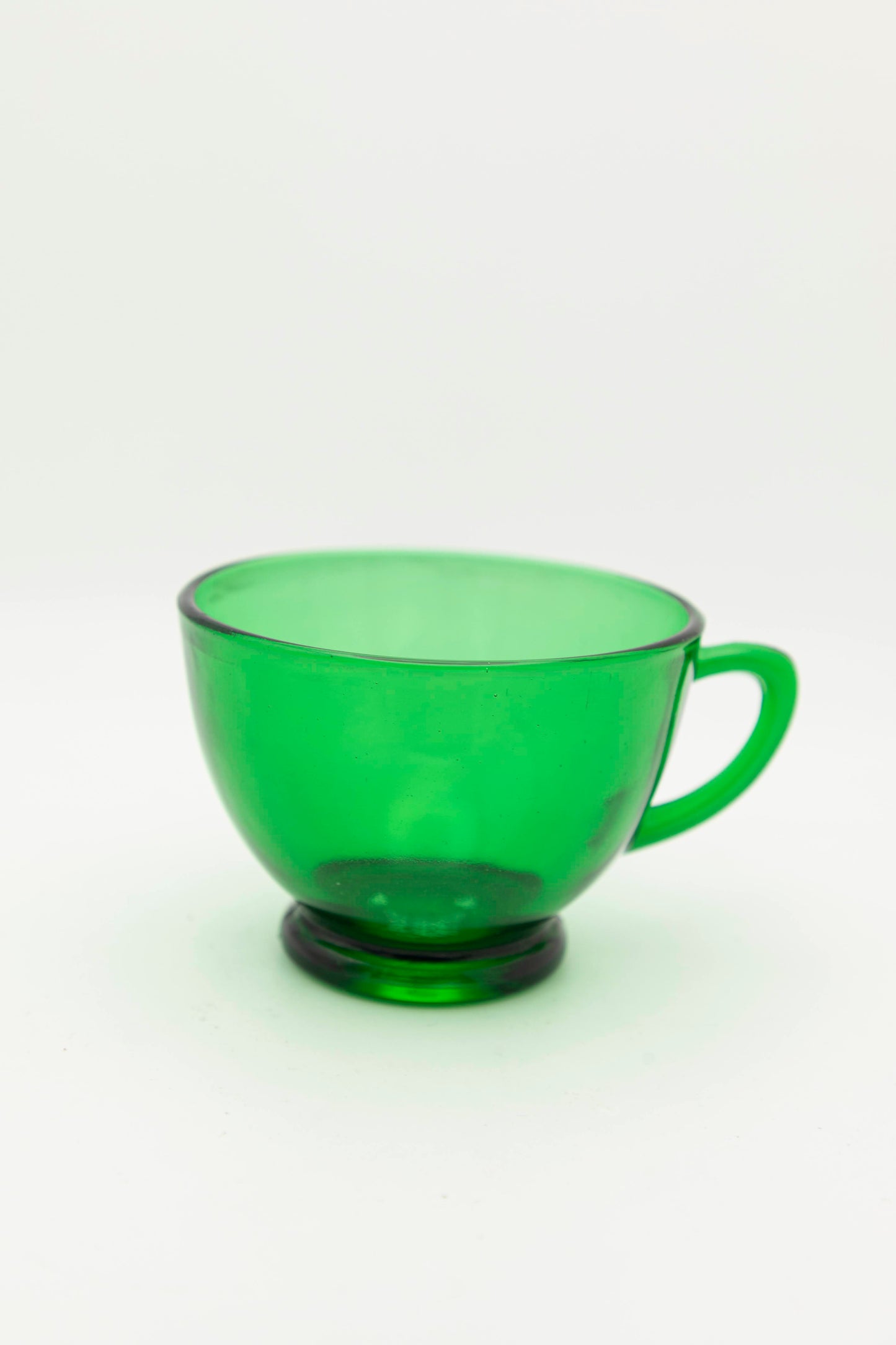 green glass teacup