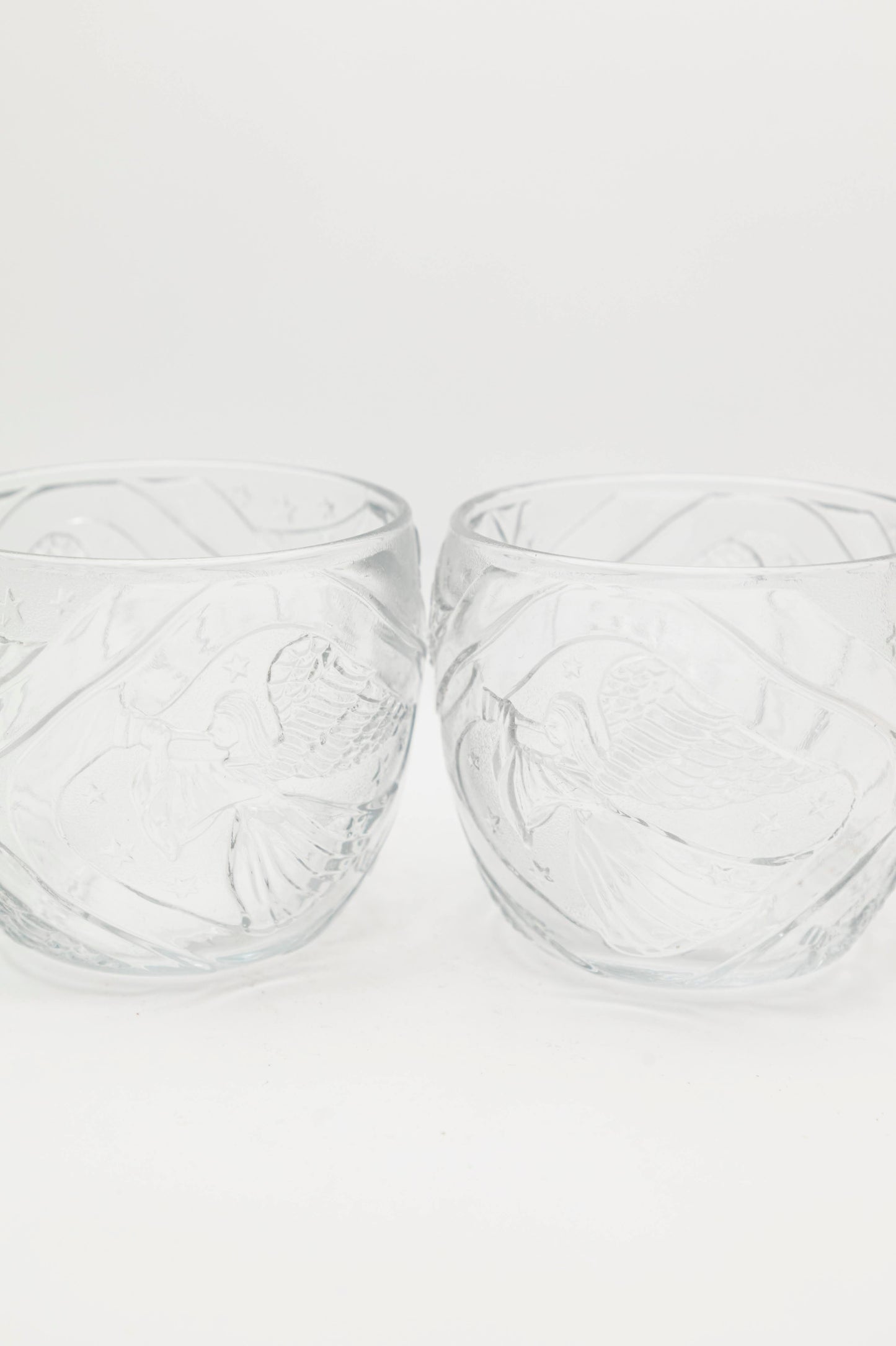 glass serving dish with angels and line design