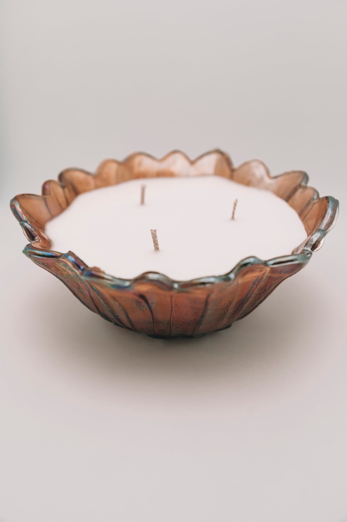 sunflower shaped brown/orange vessel