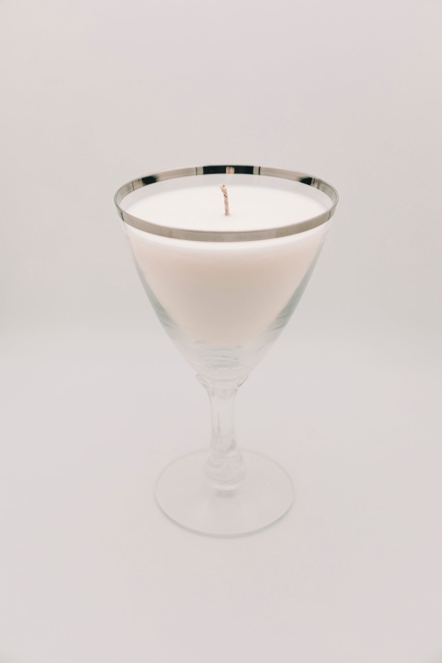 silver rimmed drinking glass