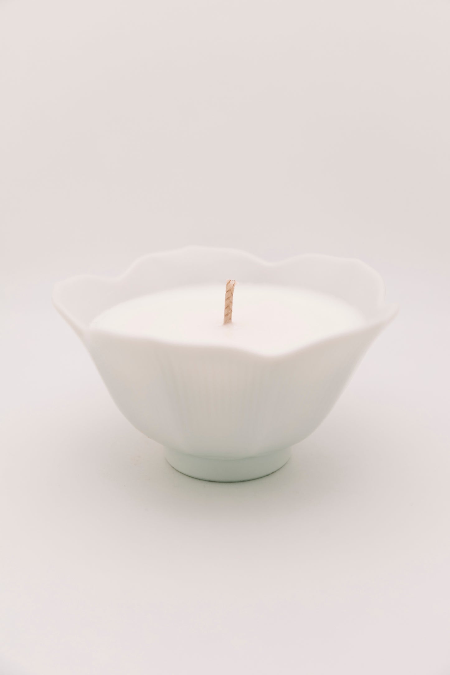 floral shaped white ceramic vessel