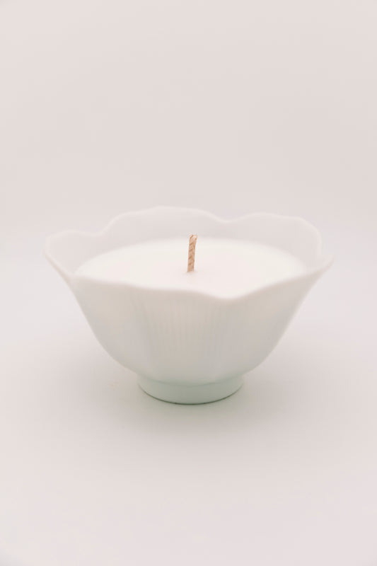 floral shaped white ceramic vessel