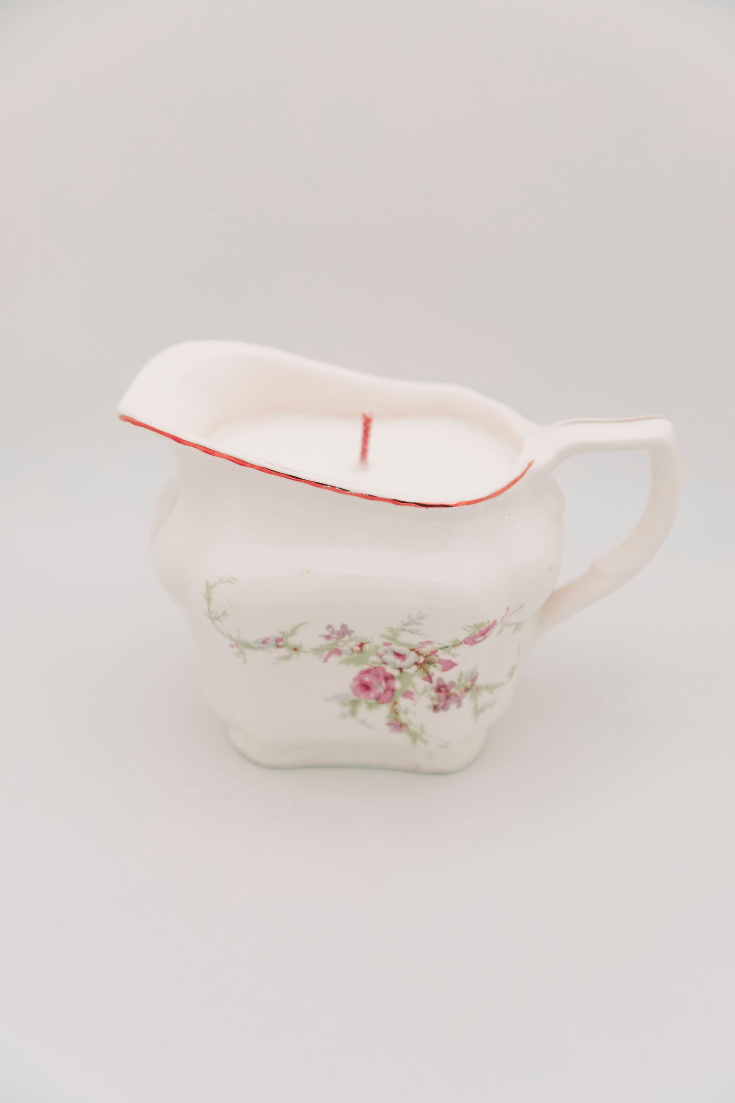 floral ceramic creamer vessel