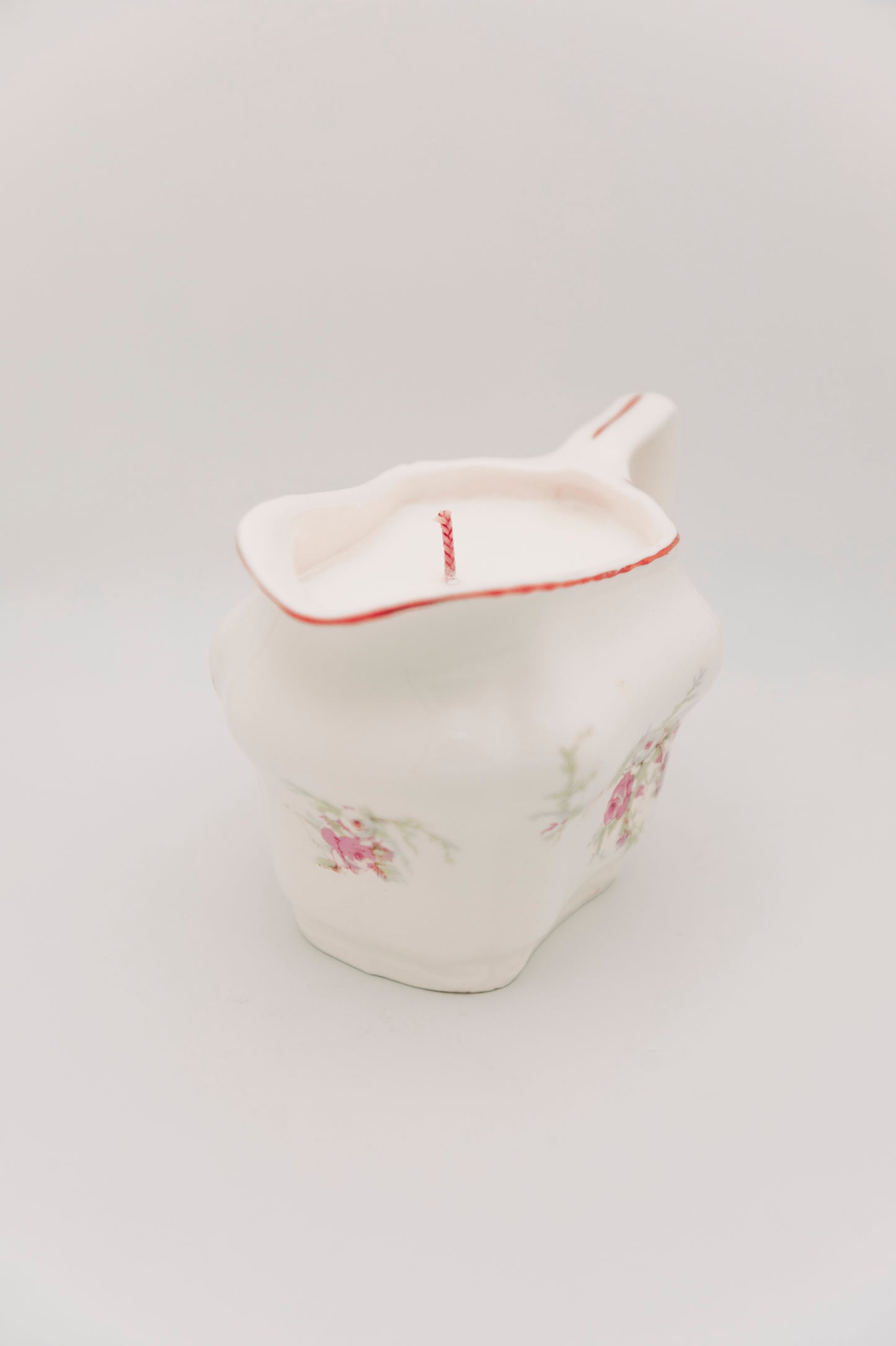 floral ceramic creamer vessel