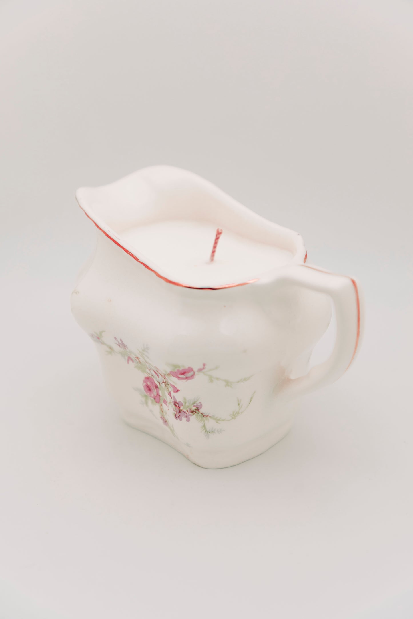 floral ceramic creamer vessel