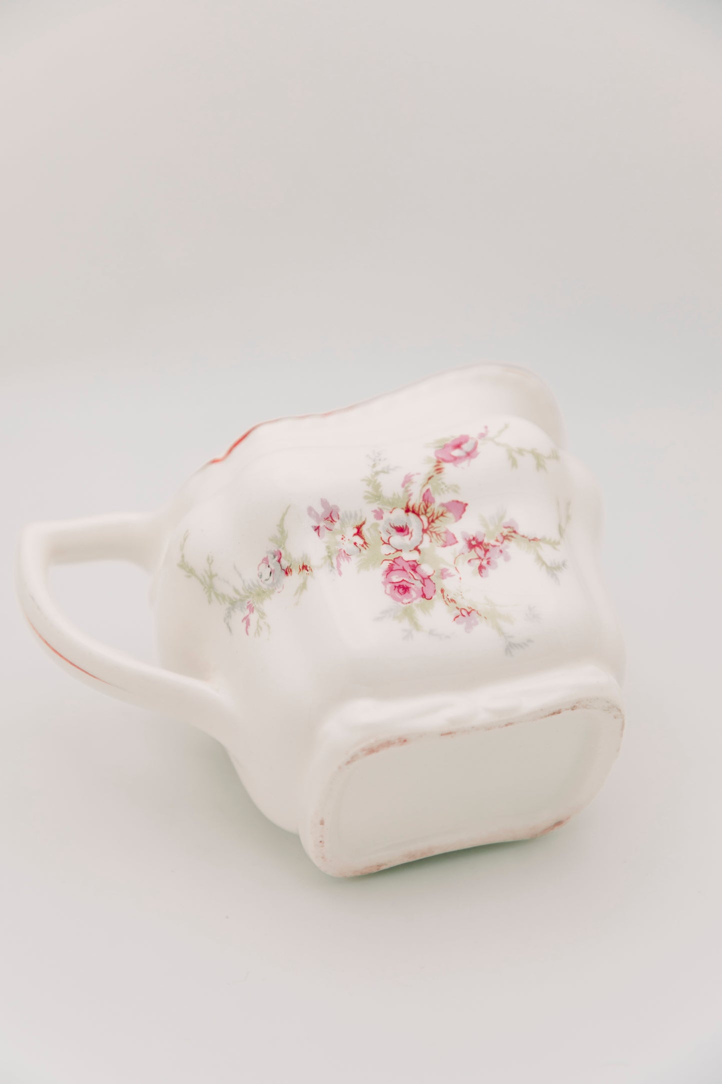 floral ceramic creamer vessel