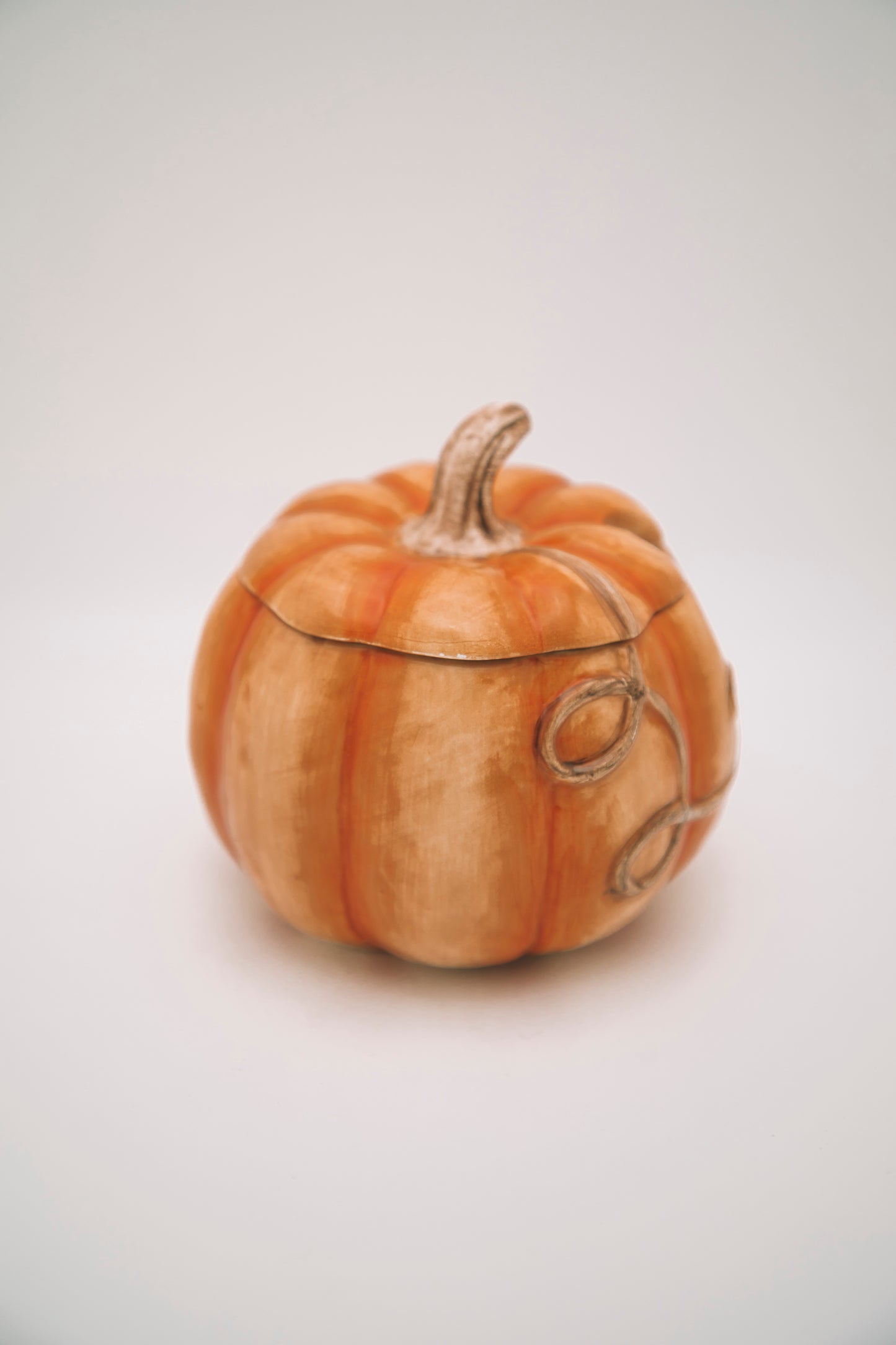 orange short pumpkin vessel