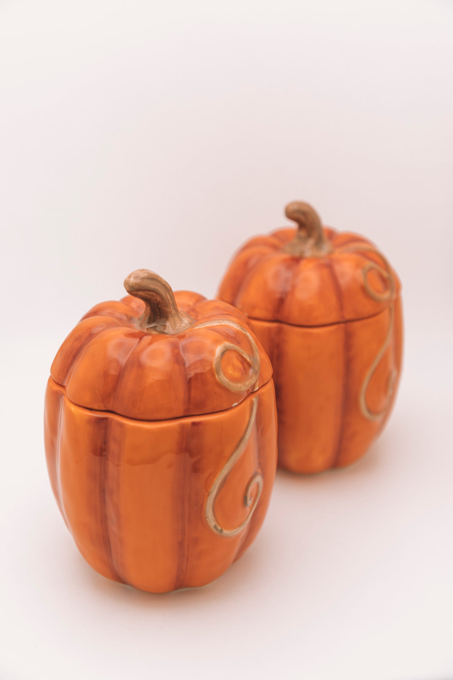 tall orange pumkin vessels